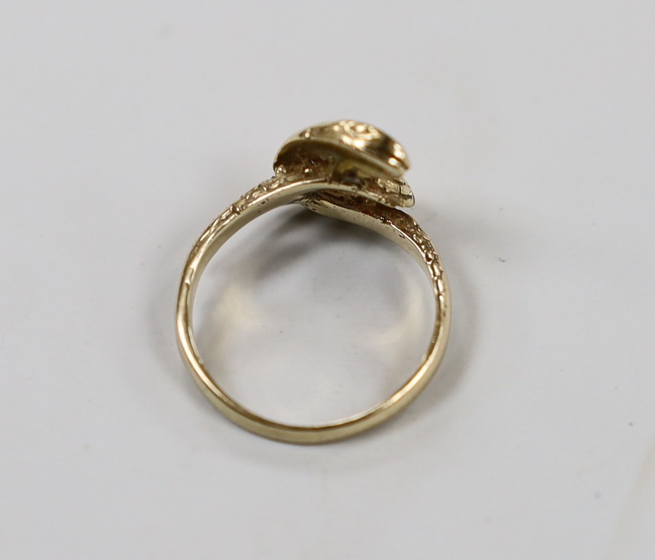 A 1970's? 9ct gold entwined serpent ring, size J, 3.3 grams.